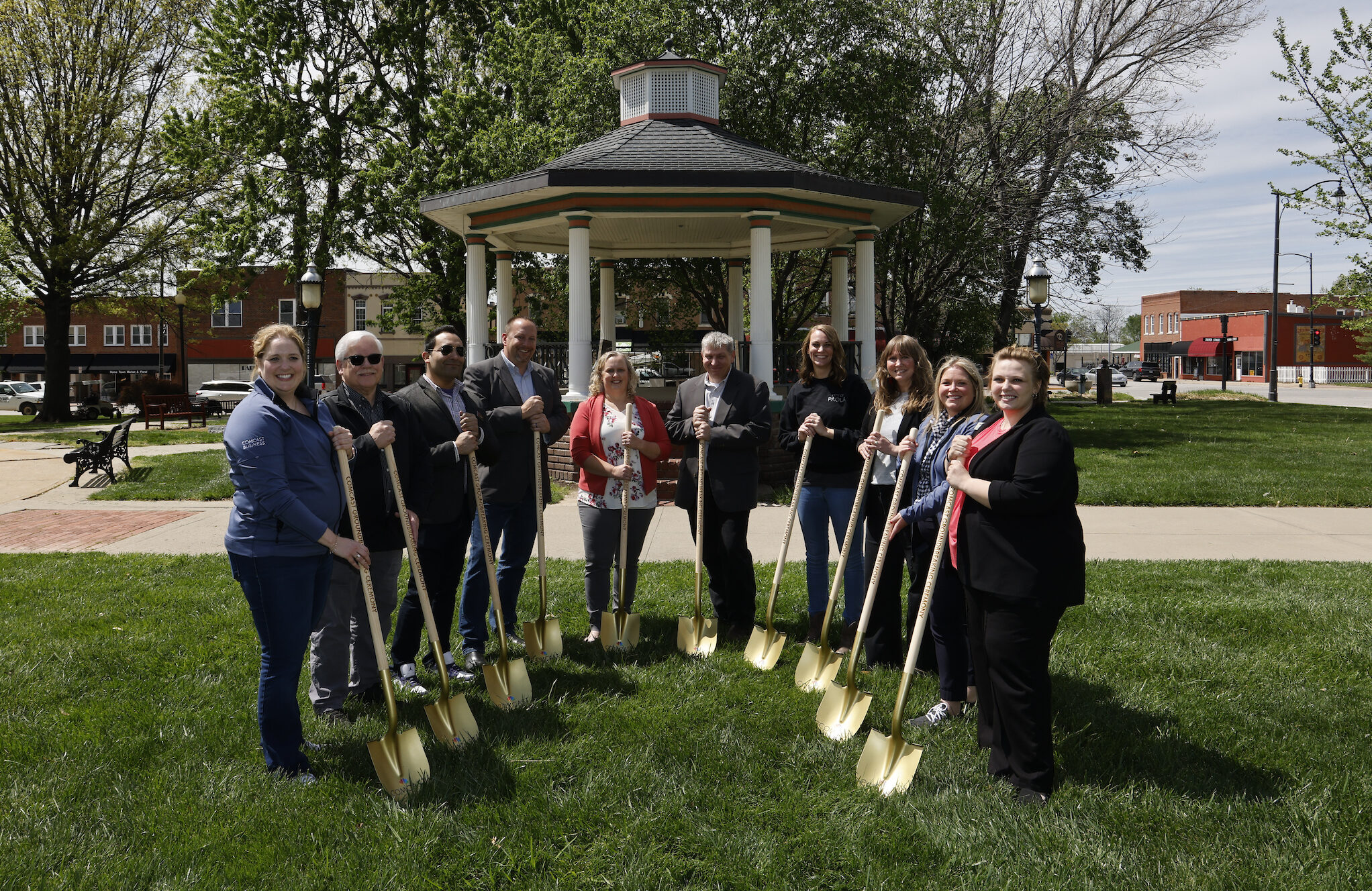 omcast representatives and Paola city officials during a groundbreaking ceremony on Friday, April 19, 2024 in Paola, Kan. (Colin E. Braley/AP Images for Comcast)