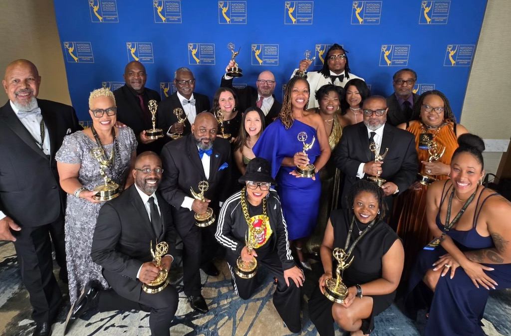 Group of people accepting Emmy award